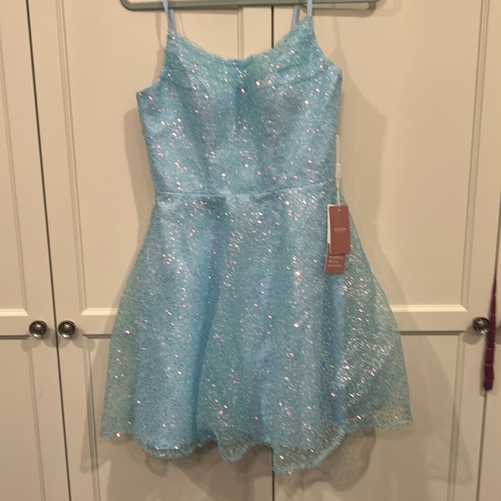 Homecoming dress from Stacee’s. Size 4.  Brand new, unworn with tags attached.